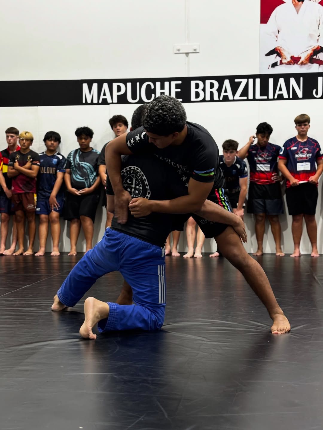 Two grapplers in gi during an advanced session