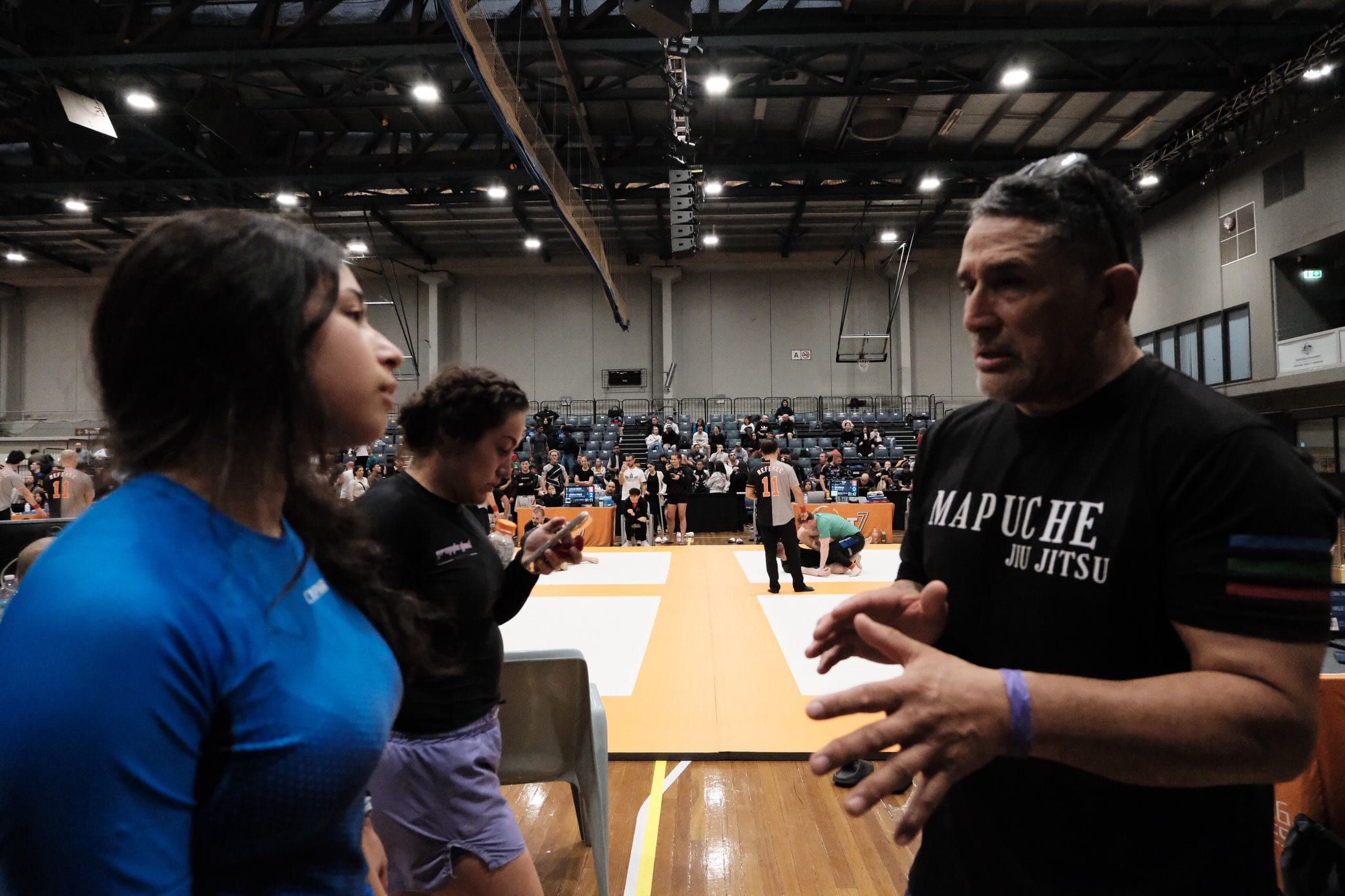 Coaching from the side of the mat at a competition